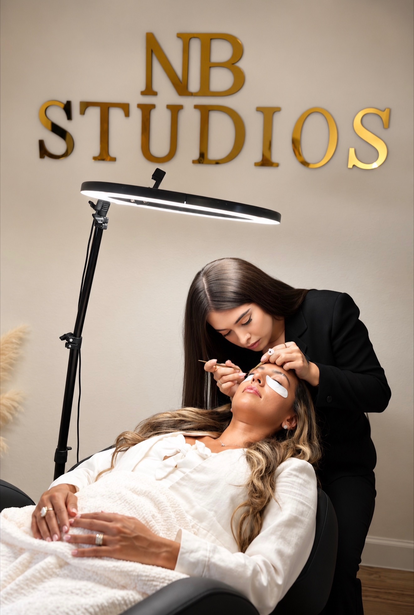 Natalia Garcia of Natalia Beauty LLC applying lash extensions at NB Studios in Sarasota, Florida